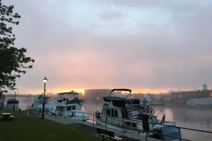 Boats docking at Old Mill Park in Campbellford under the sunrise